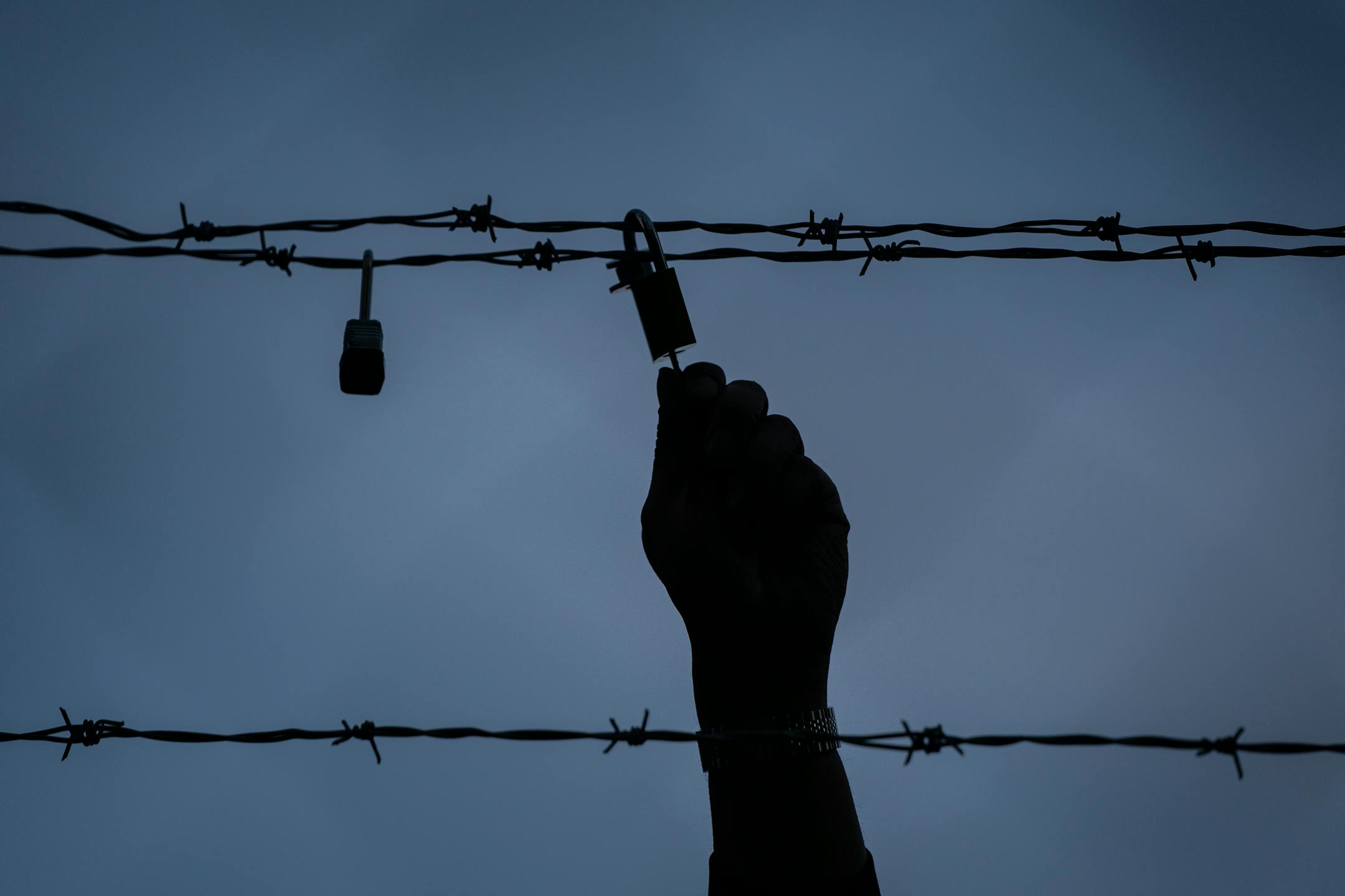 A lock was placed on the barbed wire above the fence outside the Hennepin County Government Center during the Locks for Loved Ones Lost: Part II event.