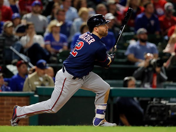 Brian Dozier followed the flight of his bases-clearing double that gave the Twins the lead at Texas.