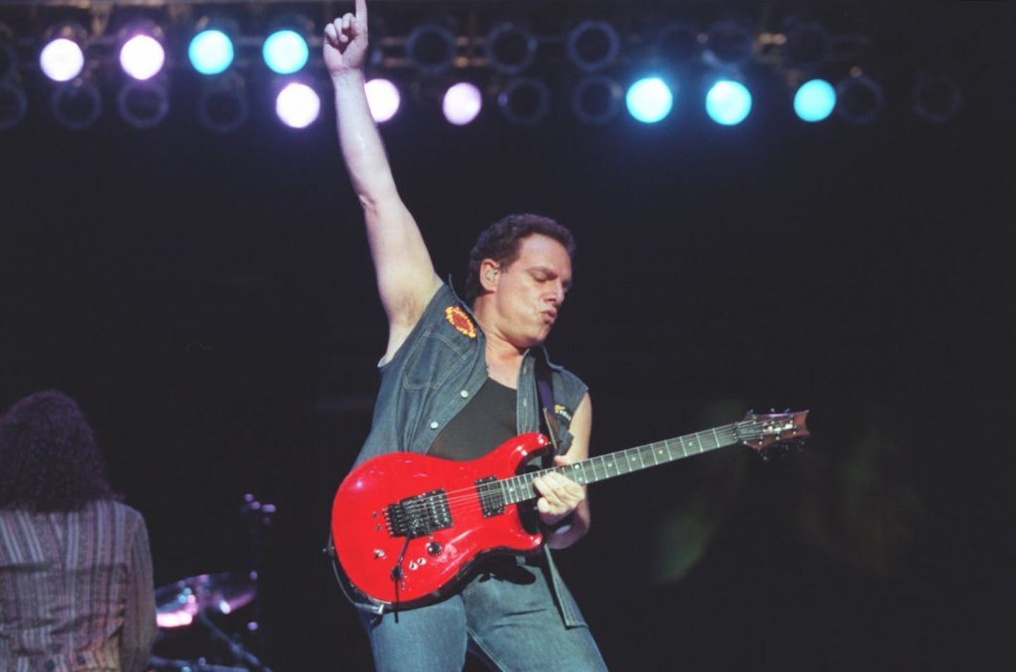 FILE, August 1999 -- Journey lead guitarist Neal Schon performs at the State Fair in St. Paul.