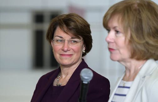 Amy Klobuchar, left, and Tina Smith.