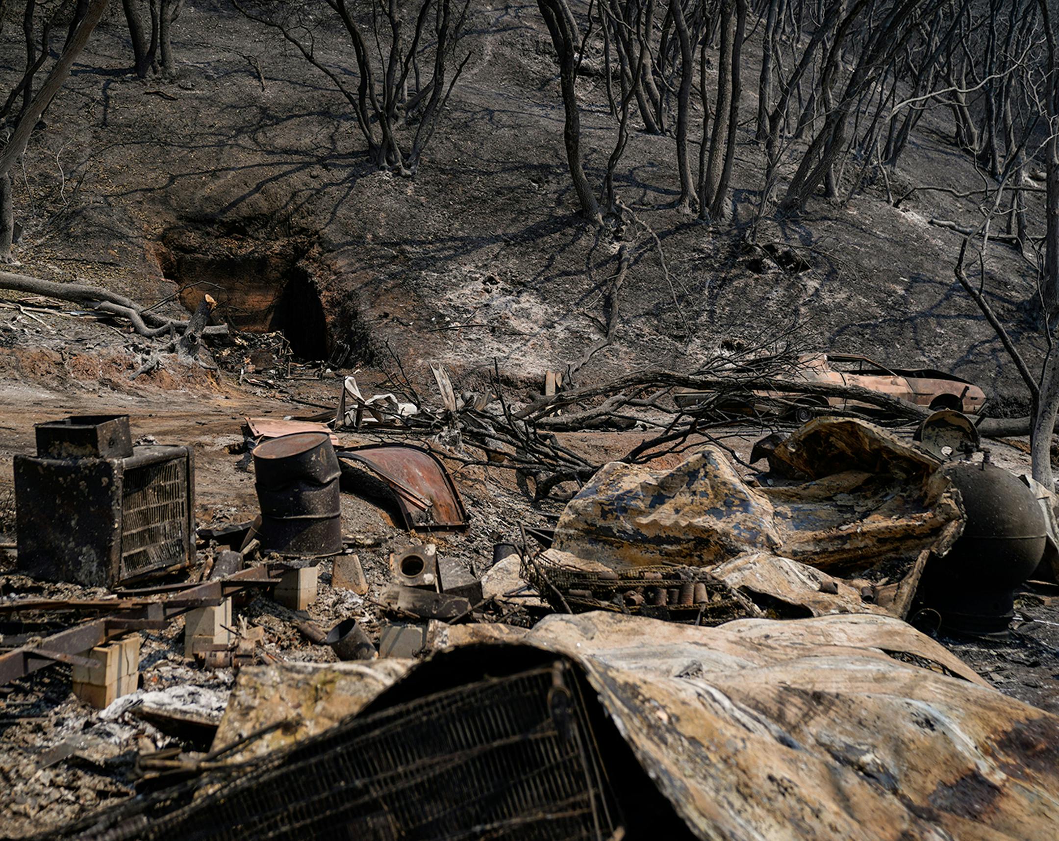 In this file photo, burnt out wreckage at a property along CA-128 where the LNU Lightning complex fire tore through last week, photographed on Tuesday, Aug. 25, 2020 in Napa, CA. (Kent Nishimura/Los Angeles Times/TNS)
