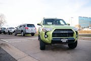 Used cars for sale are lined up on display outside Walser Toyota Wednesday, Dec. 1, 2021 in Bloomington, Minn. Used car prices are up 30 percent over 