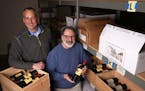 John Desteian, right, owner of Lompian Wines, a small importer of European wines, employs 10 people including operations manager Mark Mueller. Desteia