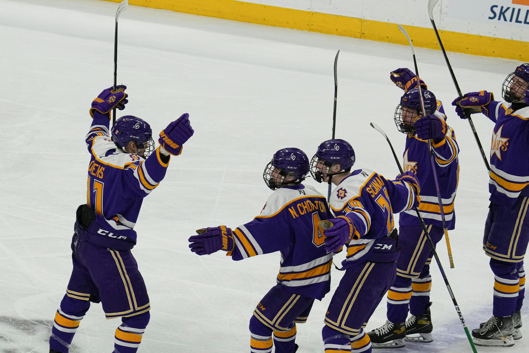 Cretin-Derham Hall forward Charles Owens (11) celebrates the first goal of the game against Maple Grove in the first period.