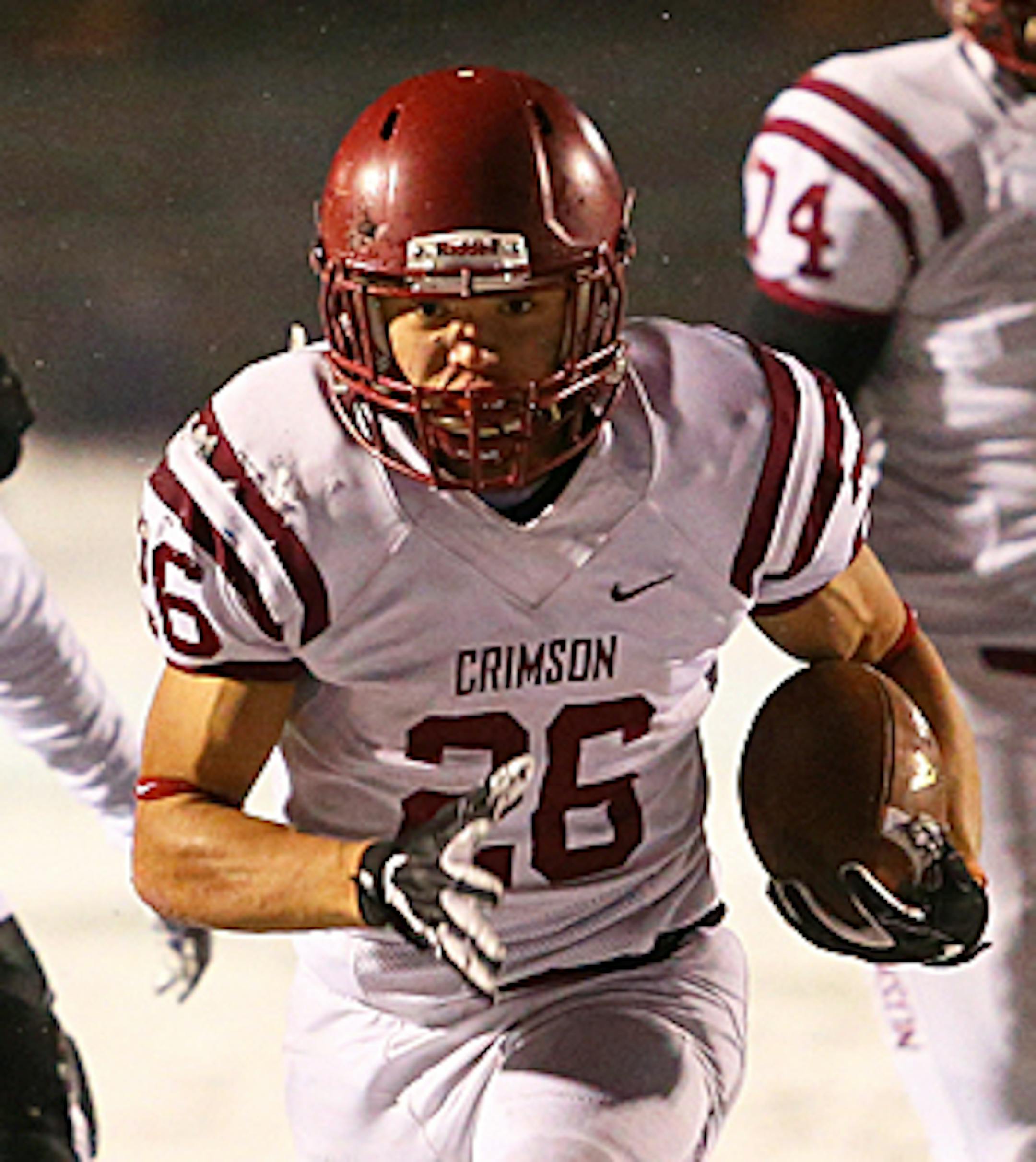Junior running back Evan Hull (26) heads to the end zone to put Maple Grove up 14-0 early in the first half. The Crimson lead the Raiders 28-14 going into hafltime at Roseville High School. Photo by Cheryl Myers, SportsEngine