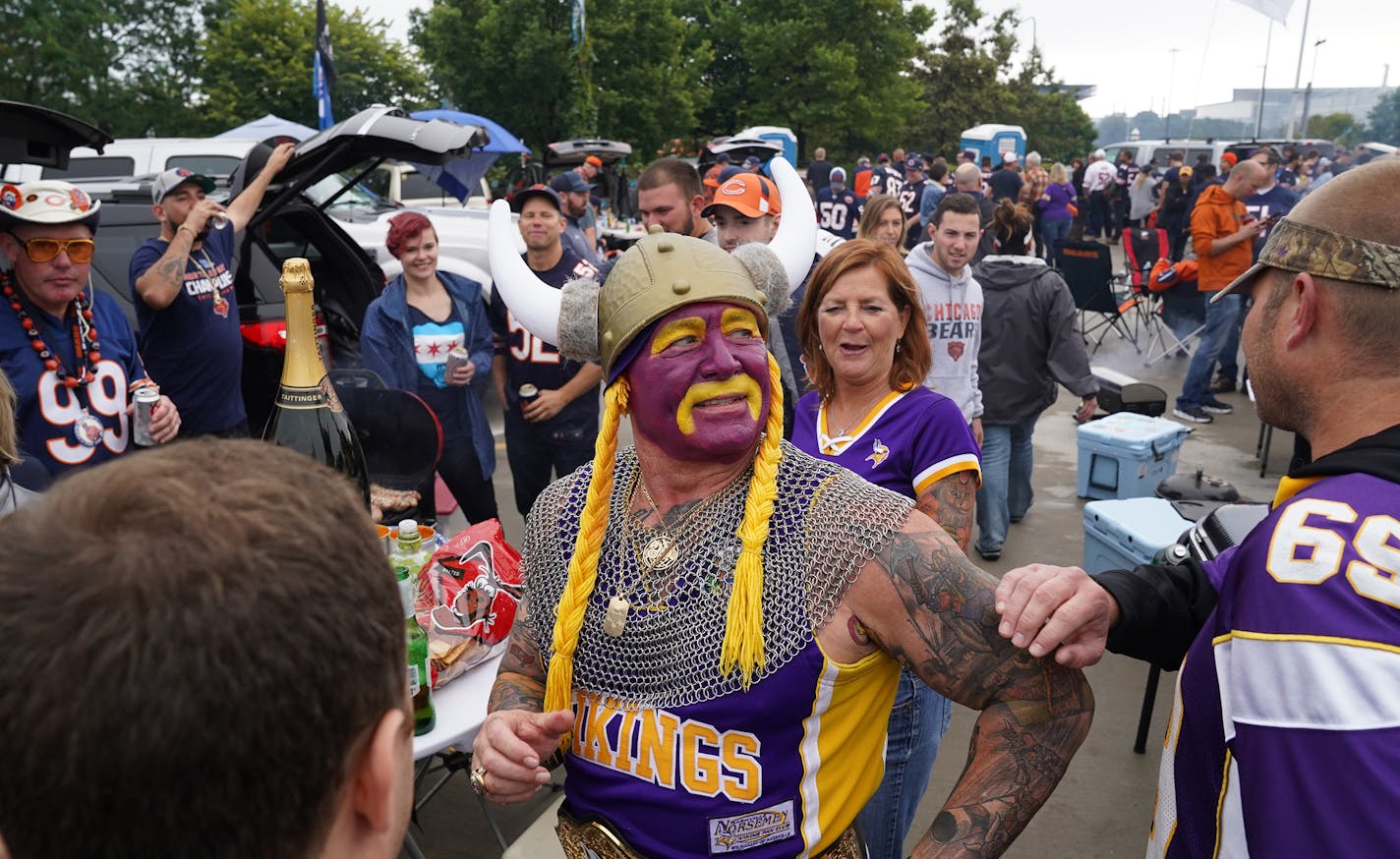 Minnesota Vikings superfan Syd Davy of Vancouver, British Columbia got a pat on the shoulder from a fellow Vikings fan as he mingled with Bears fans while tailgating at the Waldron Parking Deck prior to Sunday's game between the Minnesota Vikings and the Chicago Bears at Soldier Field. ] ANTHONY SOUFFLE &#x2022; anthony.souffle@startribune.com The Minnesota Vikings played the Chicago Bears in an NFL football game Sunday, Sept. 29, 2019 at Soldier Field in Chicago.