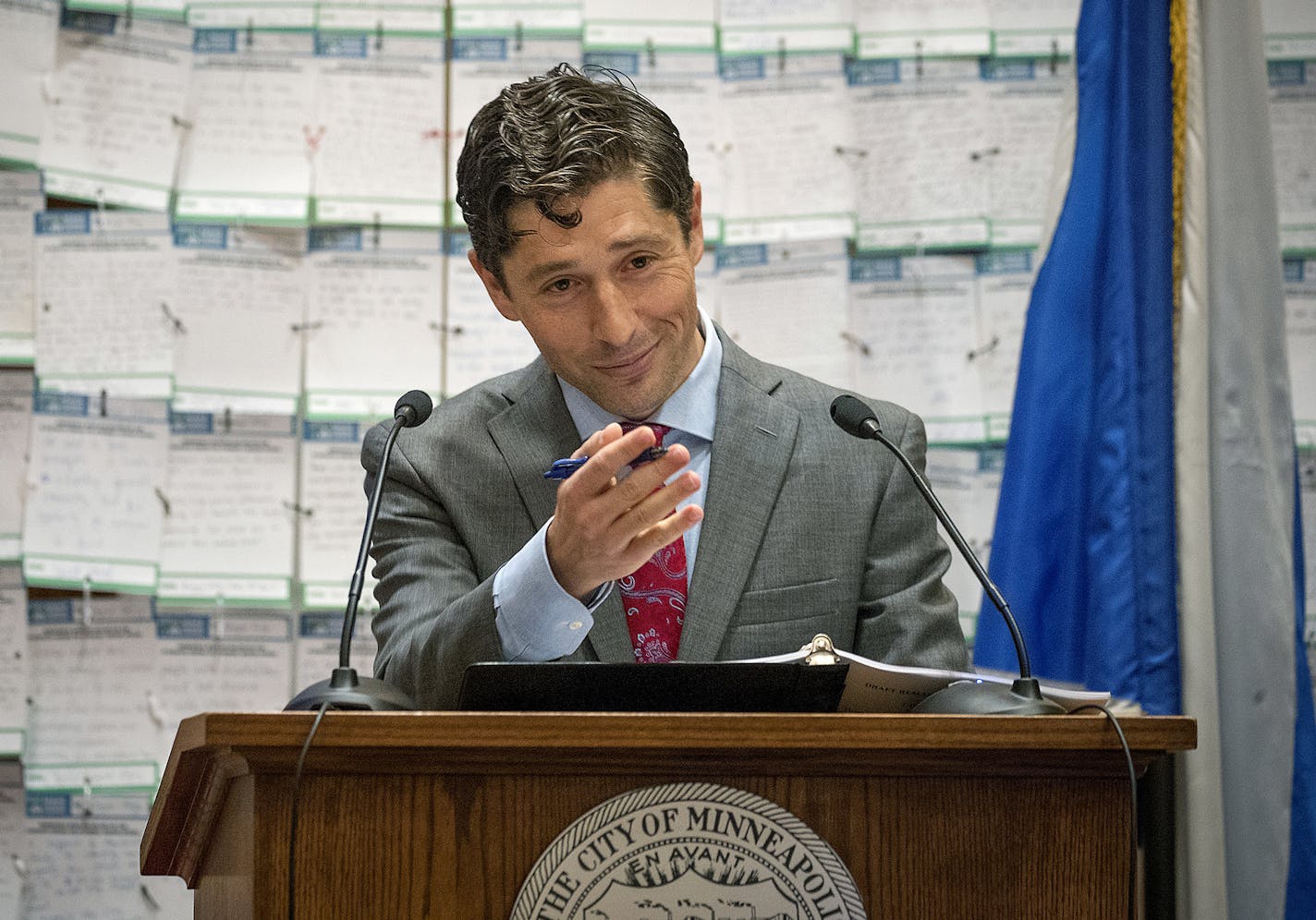 Minneapolis Mayor Jacob Frey gives his first budget address in front of notes to him from the people about the affordability of housing, at Minneapolis City Hall, Wednesday, Aug. 15, 2018, in Minneapolis. (Elizabeth Flores/Star Tribune via AP)