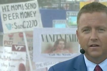 This plea for beer money appeared behind Kirk Herbstreit on ESPN's "College GameDay" on Saturday morning.