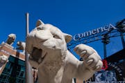 Giant tiger statues are on display outside of Comerica Park, home of the Detroit Tigers, Sunday, April 02, 2023 in Detroit, MI.   ]

ALEX KORMANN • 