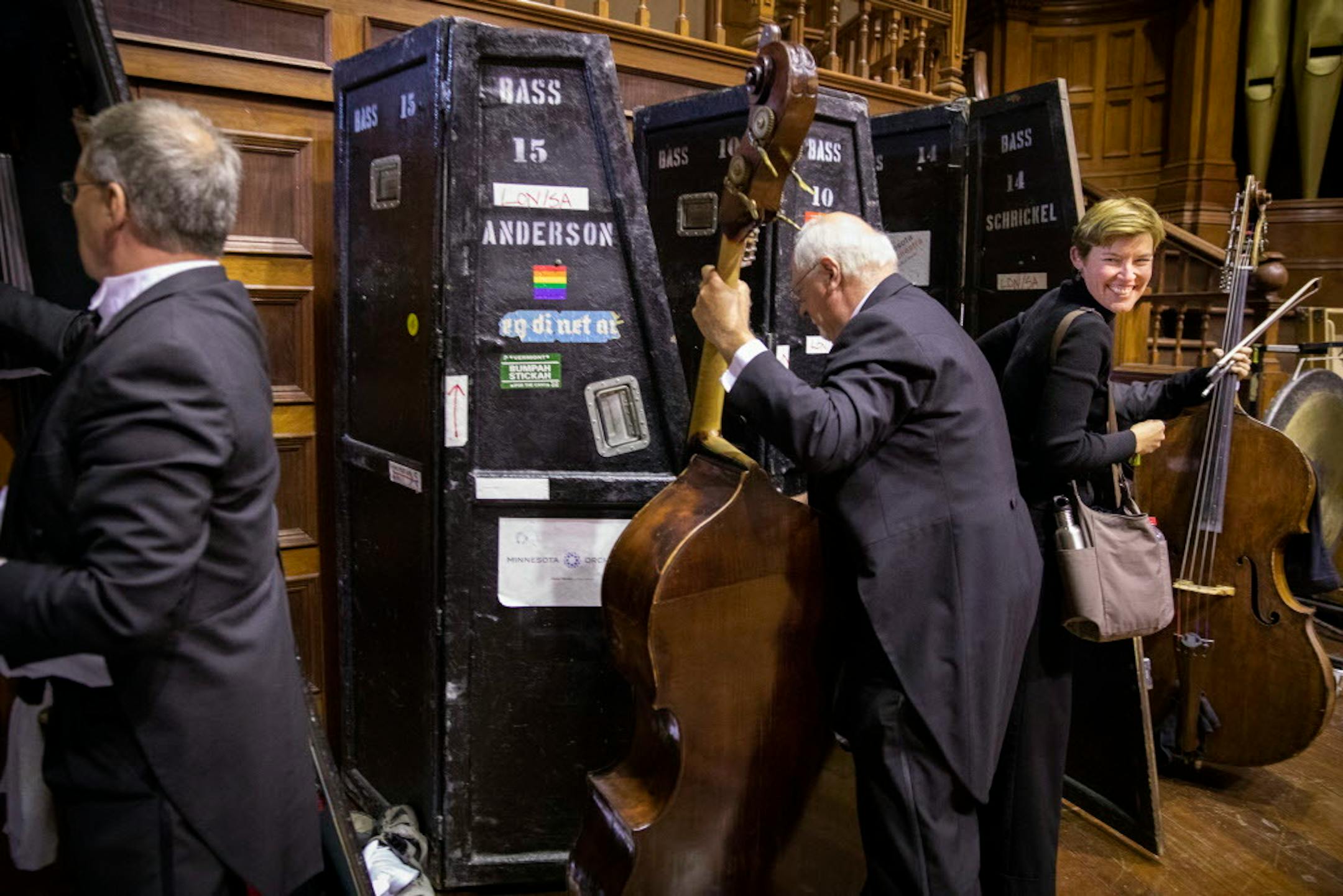 Bass players pack up their instruments into their trunks after the Durban concert in South Africa.