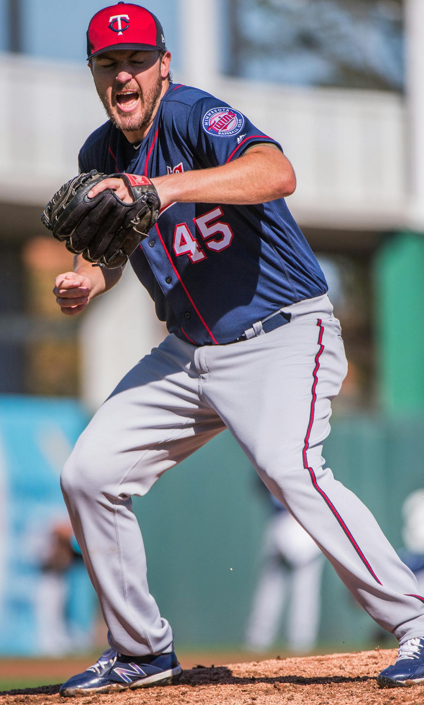 Twins pitcher Phil Hughes flinched as he missed a ball during drills. ] MARK VANCLEAVE &#xef; mark.vancleave@startribune.com * Third day of pitcher and catcher workouts at Twins spring training in Fort Myers, Florida on Friday, Feb. 16, 2018.