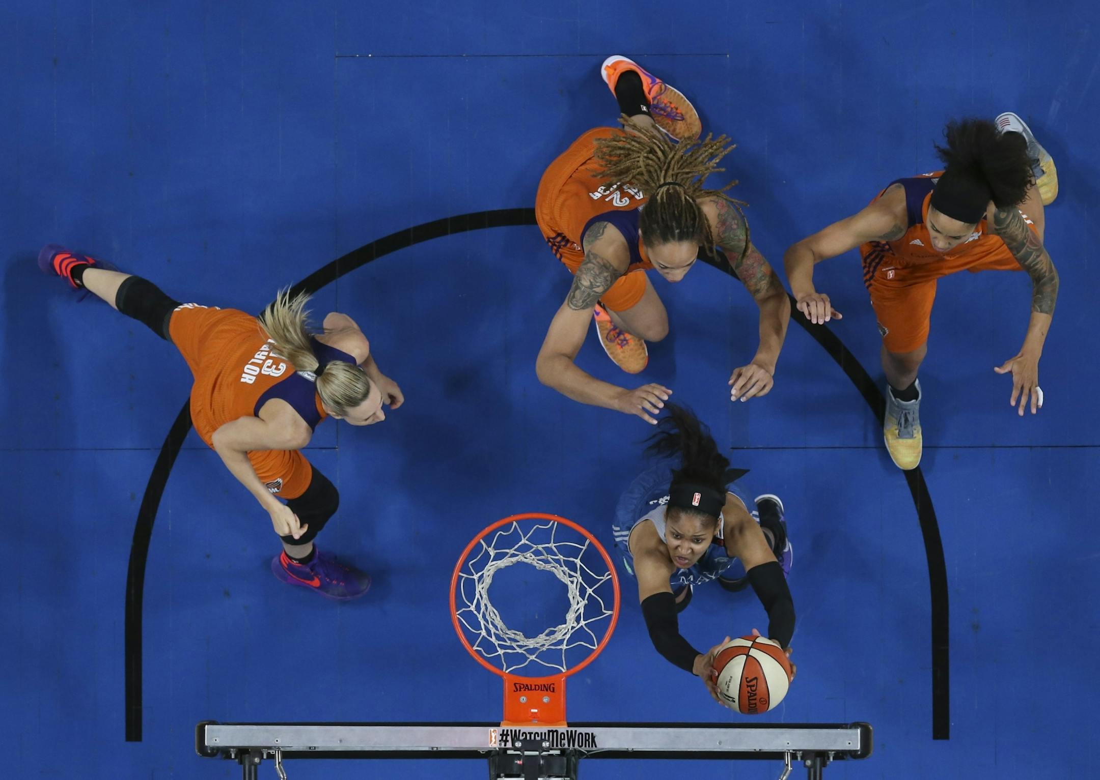 Minnesota Lynx forward Maya Moore (23) was triple teamed in the first half as she hit two of her 26 points for the night.