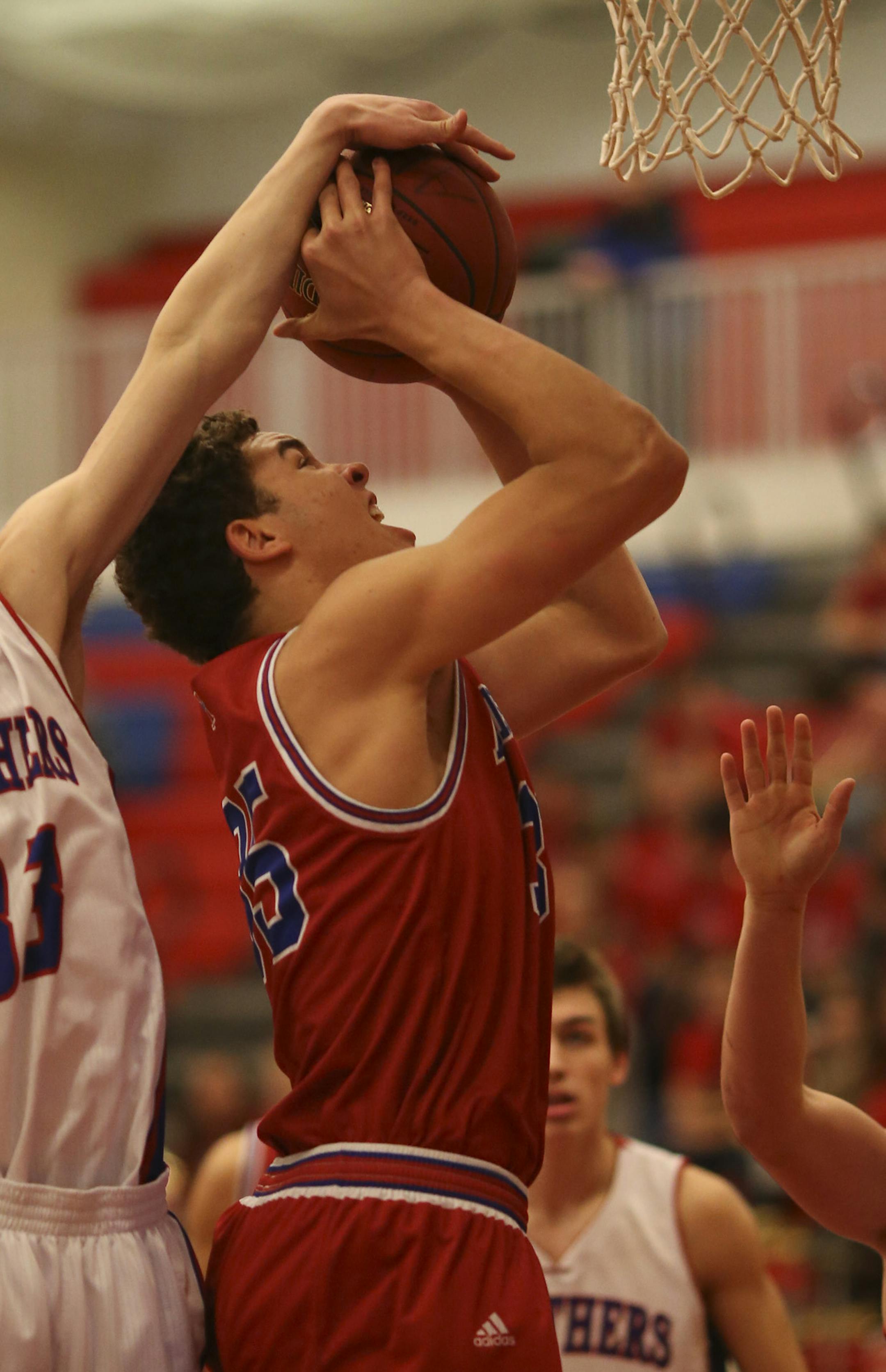 Armstrong's Race Thompson was fouled by Spring Lake Park's Mark Raihle while shooting in the first half Thursday night. ] JEFF WHEELER ï jeff.wheeler@startribune.com Robbinsdale Armstrong High School defeated Spring Lake Park 68-34 Thursday night, February 4, 2016 at Armstrong.