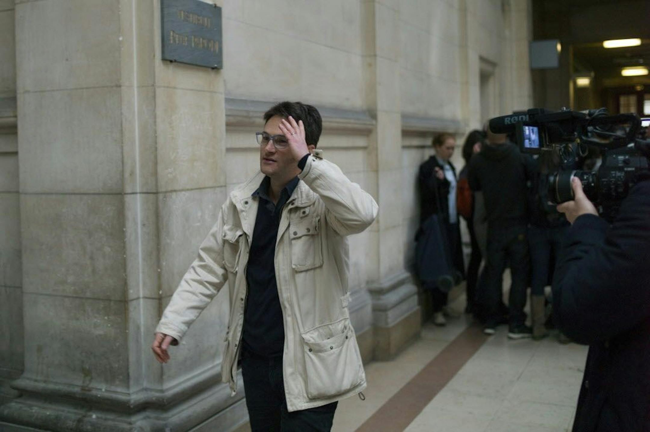 Receiver Yonathan Birn arrives at his trial in Paris, Monday Feb. 20, 2017, accused of involvement in one of the world's biggest art heists. Three people, including Birn are accused of involvement in a dramatic 2010 theft of more than $100 million worth of artworks from the Paris Museum of Modern Art, including a Picasso, a Matisse and other masterpieces.