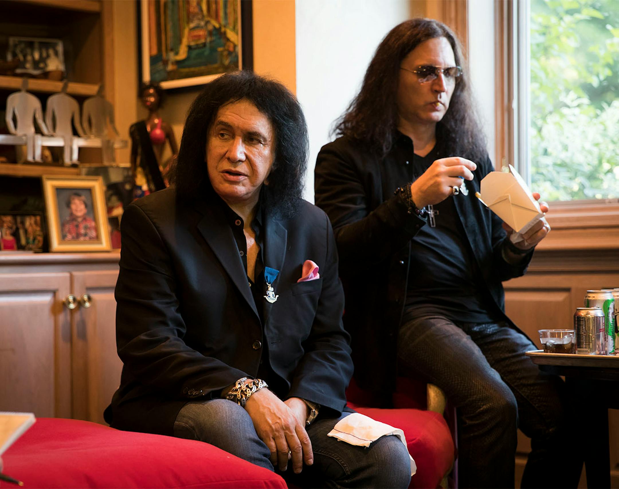 Kiss' Gene Simmons and drummer Eric Singer during an interview before a charity concert at the home of local philanthropist Martha "Muffy" MacMillan on Tuesday, August 2, 2016, in Long Lake, Minn.
