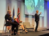 Norwegian Prime Minister Jonas Gahr Støre, pointing to a map, joined U.S. Sen. Amy Klobuchar, D-Minn., and moderator Tom Hanson at an event at Norway