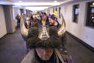 Tim Burk of Ogilvie waited in a long line in the skyway for the doors of U.S. Bank Stadium to open Sunday morning. Vikings fans flocked to the skyway 