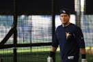 Tampa Bay Rays' Logan Morrison walks into the batting cage to hit during a spring training baseball workout in Port Charlotte, Fla., Wednesday, Feb. 2