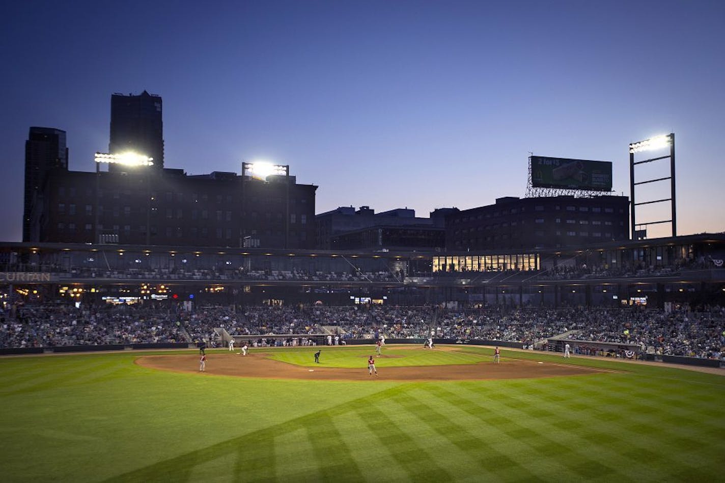 The St. Paul, Minn., skyline is visible beyond CHS Field on Thursday night, May 21, 2015, as the St. Paul Saints hold their baseball season opener against the Fargo-Moorhead RedHawks at the new stadium. (Aaron Lavinsky/Star Tribune via AP) ORG XMIT: MIN2015052200093399