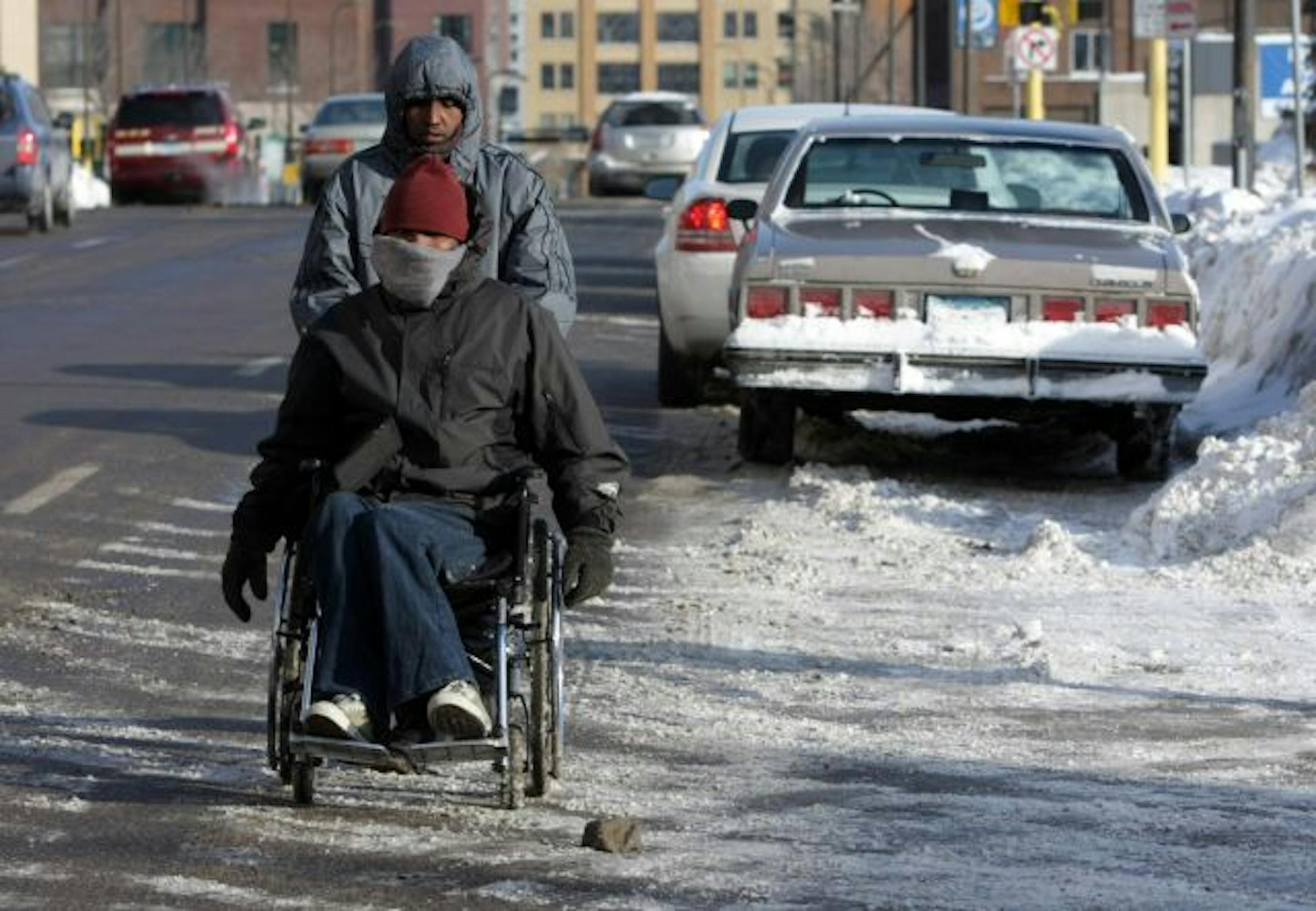 Ice and snow buildups forced Mohamed and Ahmed Olol into the traffic lane of Park Avenue.