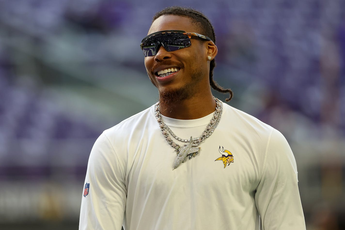 Minnesota Vikings wide receiver Justin Jefferson (18) looks on before an NFL football game against the New Orleans Saints, Sunday, Nov. 12, 2023, in St. Paul, Minn. (AP Photo/Matt Krohn)