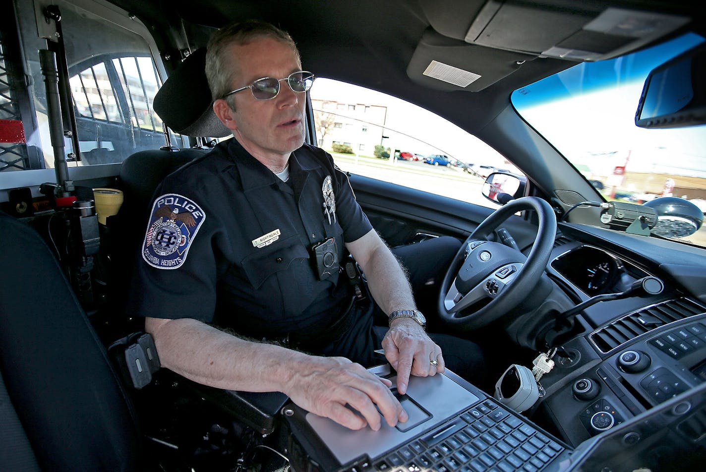 Columbia Heights police officer Terry Nightingale now wears a body cam to document every encounter he has Friday, April 17, 2015 in Columbia Heights, MN. ] (ELIZABETH FLORES/STAR TRIBUNE) ELIZABETH FLORES &#x2022; eflores@startribune.com