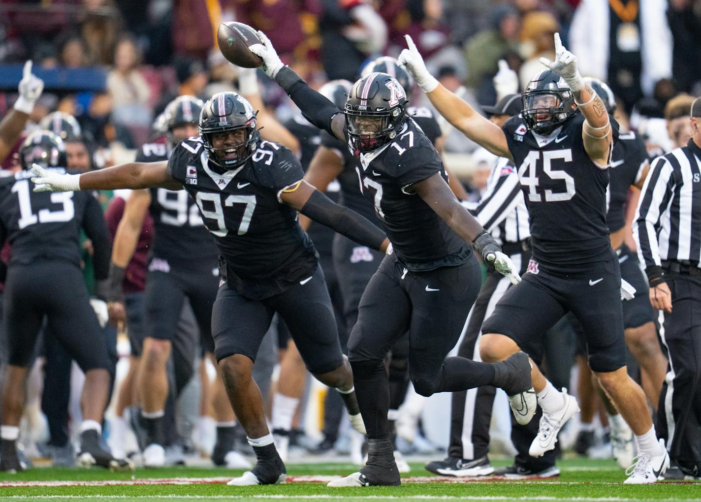 Gophers defensive lineman Jah Joyner (17) celebrates after recovering a strip sack fumble that he also forced on Michigan State quarterback Sam Leavitt in the fourth quarter Saturday.