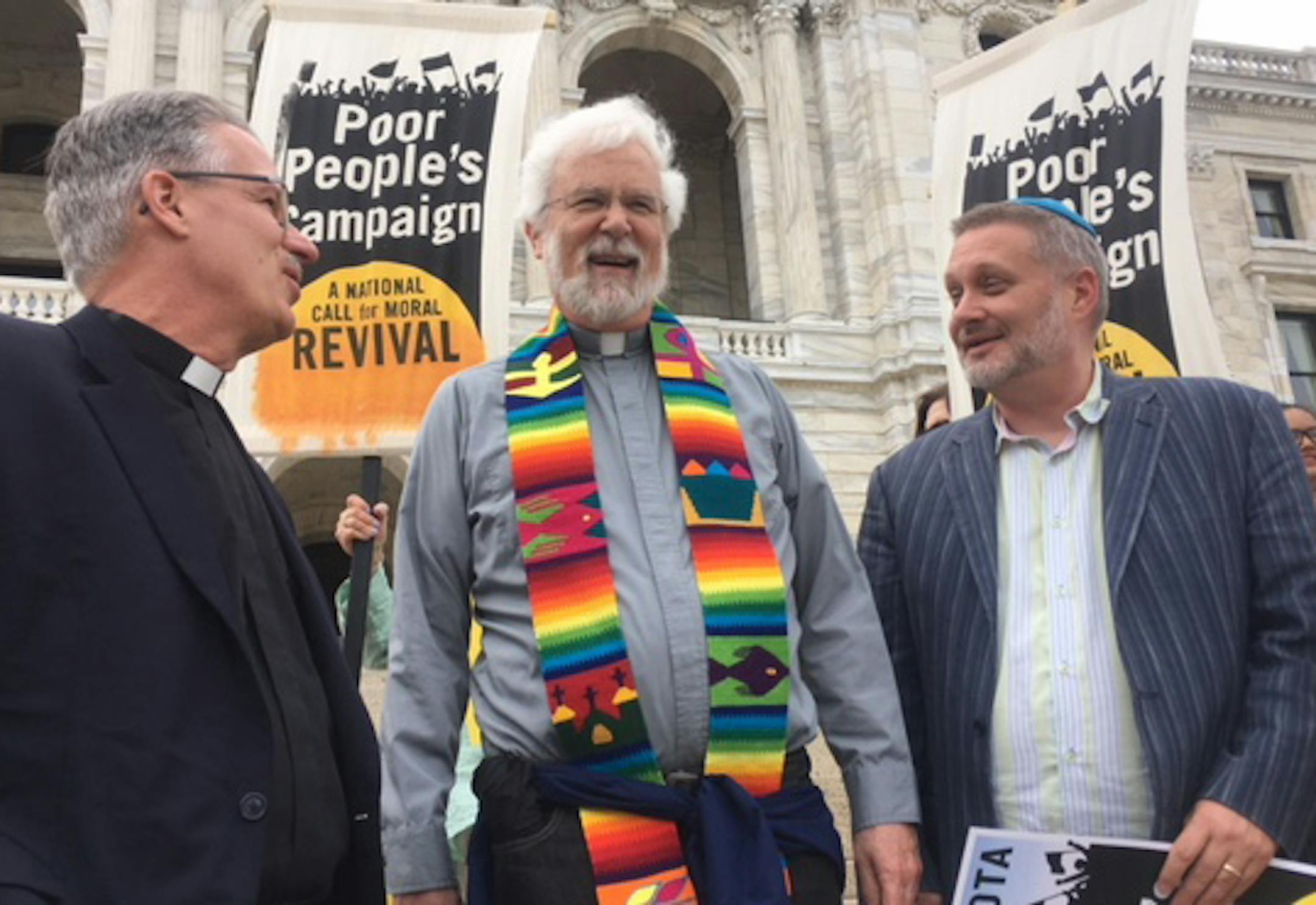 (Left to right) Rev. Curtiss DeYoung, Rev. Doug Mitchell and Rabbi Michael Latz were among the clergy at a Poor People's Campaign rally at the state capitol this week.
Photo by Jean Hopfensperger