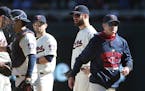 Twins&#x2019; manager Paul Molitor (right) walked back to the dugout after making a pitching change in the 7th inning. ] JIM GEHRZ &#x2022; james.gehr