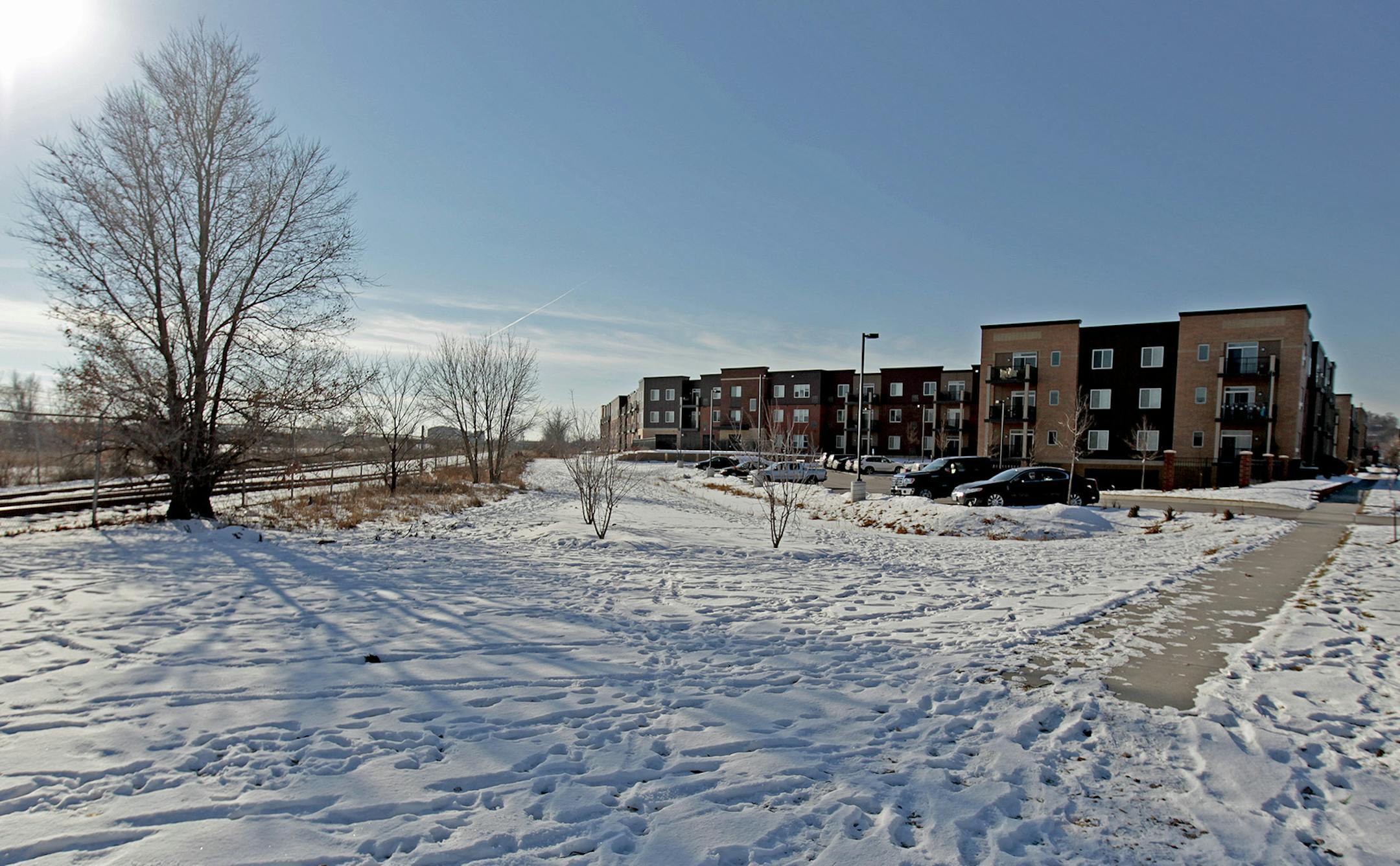 Developer Andy Chase of Chase Real Estate finished the first phase of the apartments in August -- 213 units in a pair of 3-story buildings. He says they're already 90 percent occupied and is now preparing to move ahead with a second phase, hoping the break ground in spring. ] (ELIZABETH FLORES/STAR TRIBUNE) ELIZABETH FLORES • eflores@startribune.com