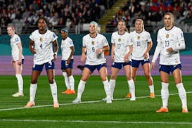 US players wait for a corner kick during the Women’s World Cup match against Portugal.
