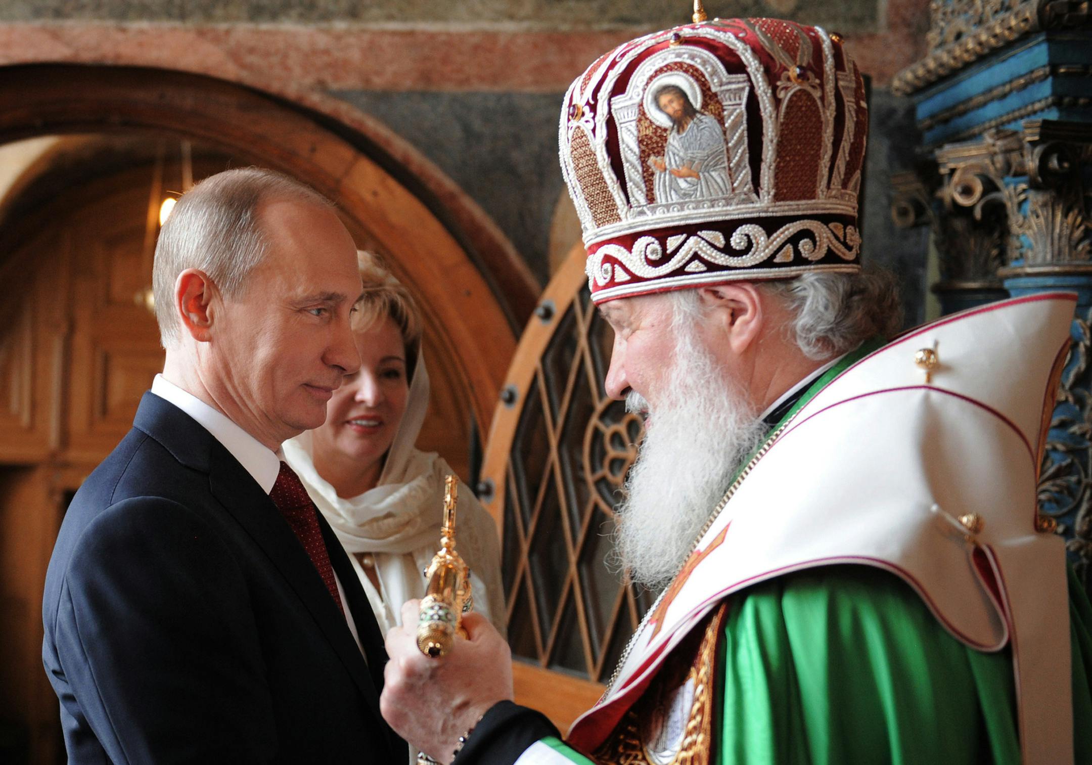 Russian President Vladimir Putin, left, and his wife Lyudmila attend a service held by Russian Orthodox Patriarch Krill, right, in the Annunciation Cathedral after the inauguration ceremony in the Kremlin in Moscow, Monday, May 7, 2012. Vladimir Putin has been sworn in as Russia's president for a third term after four years as prime minister. (AP Photo/RIA-Novosti, Alexei Druzhinin, Government Press Service)