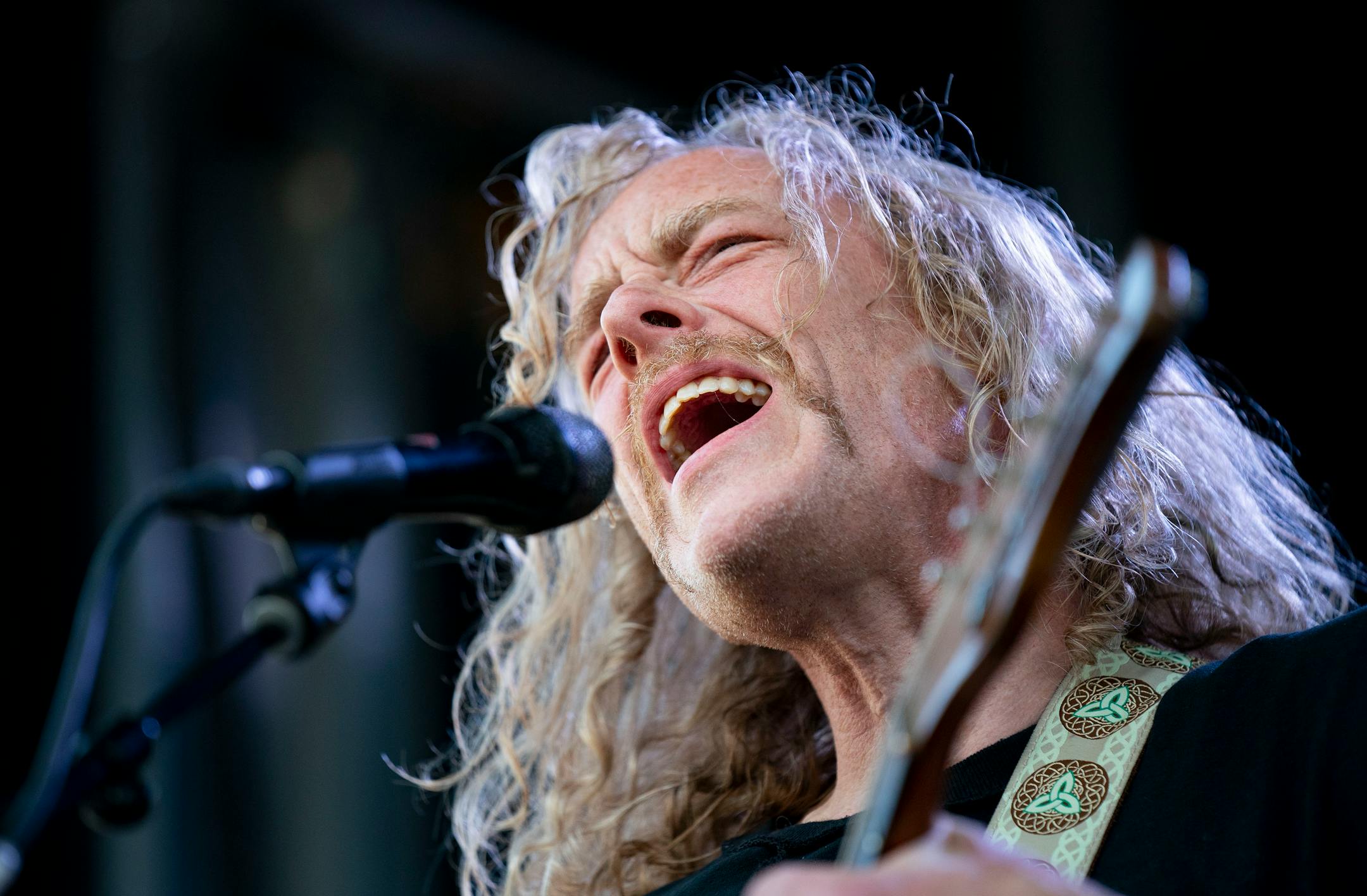 Alan Sparhawk, guitarist and vocalist for LOW, performs with his band during Rock the Garden.