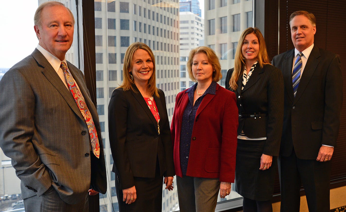 St. Paul-based AEI Capital Corp. says slow and steady is the way to long-term investment growth. The firm invests in real estate assets. CEO Bob Johnson was joined by other team members from left to right Marni Nygard, Rona Newtson , Paula Tillet and Patrick Keene. ] Richard.Sennott@startribune.com Richard Sennott/Star Tribune St Paul Minn. Thursday 1/9/2014) ** (cq)