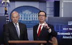 Treasury Secretary Steven Mnuchin, joined by National Economic Director Gary Cohn, speaks in the briefing room of the White House in Washington, Wedne