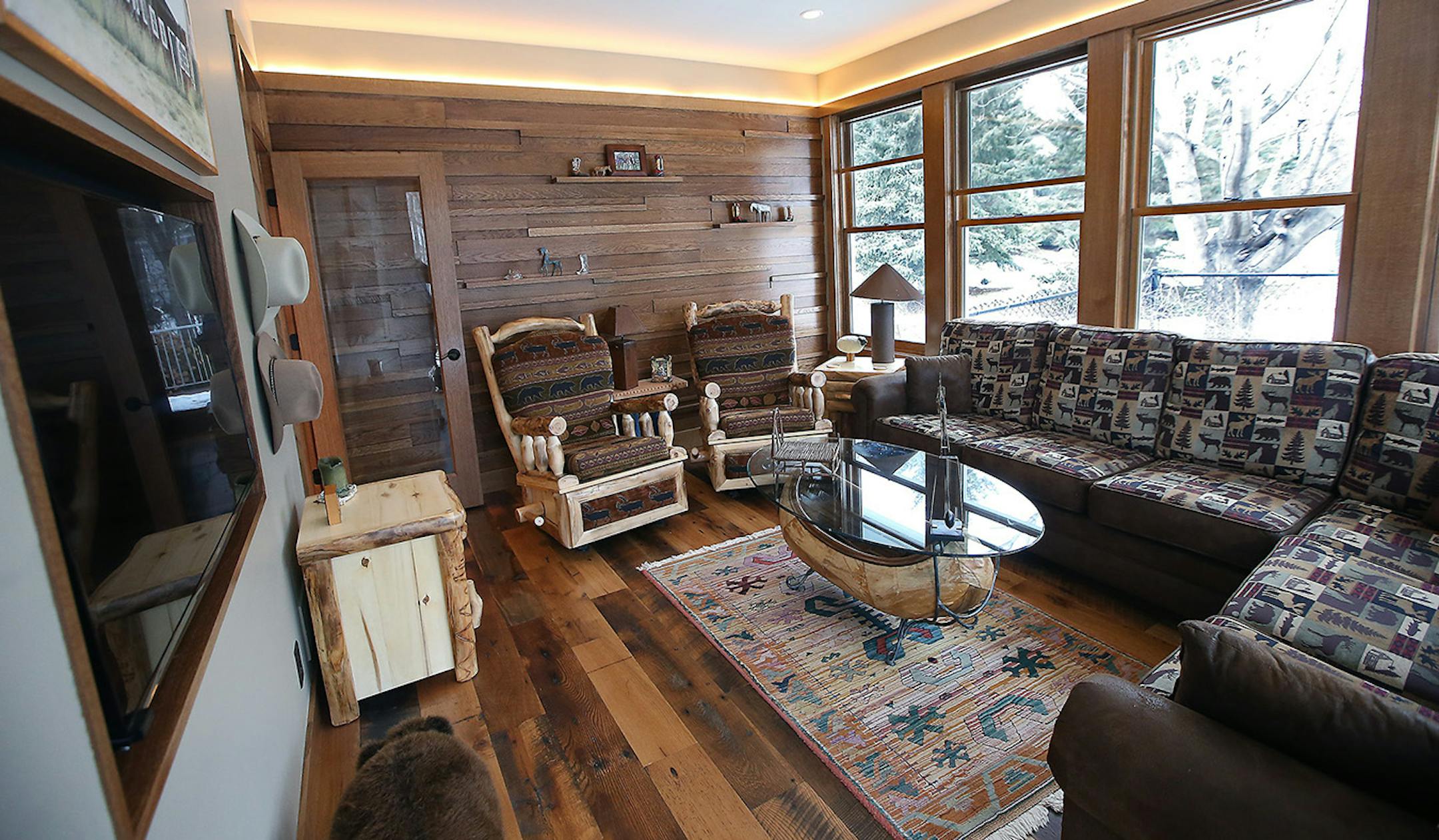 Under-utilized as a three-season porch, the year-round room is now a favorite spot for reading, watching TV or relaxing with friends.