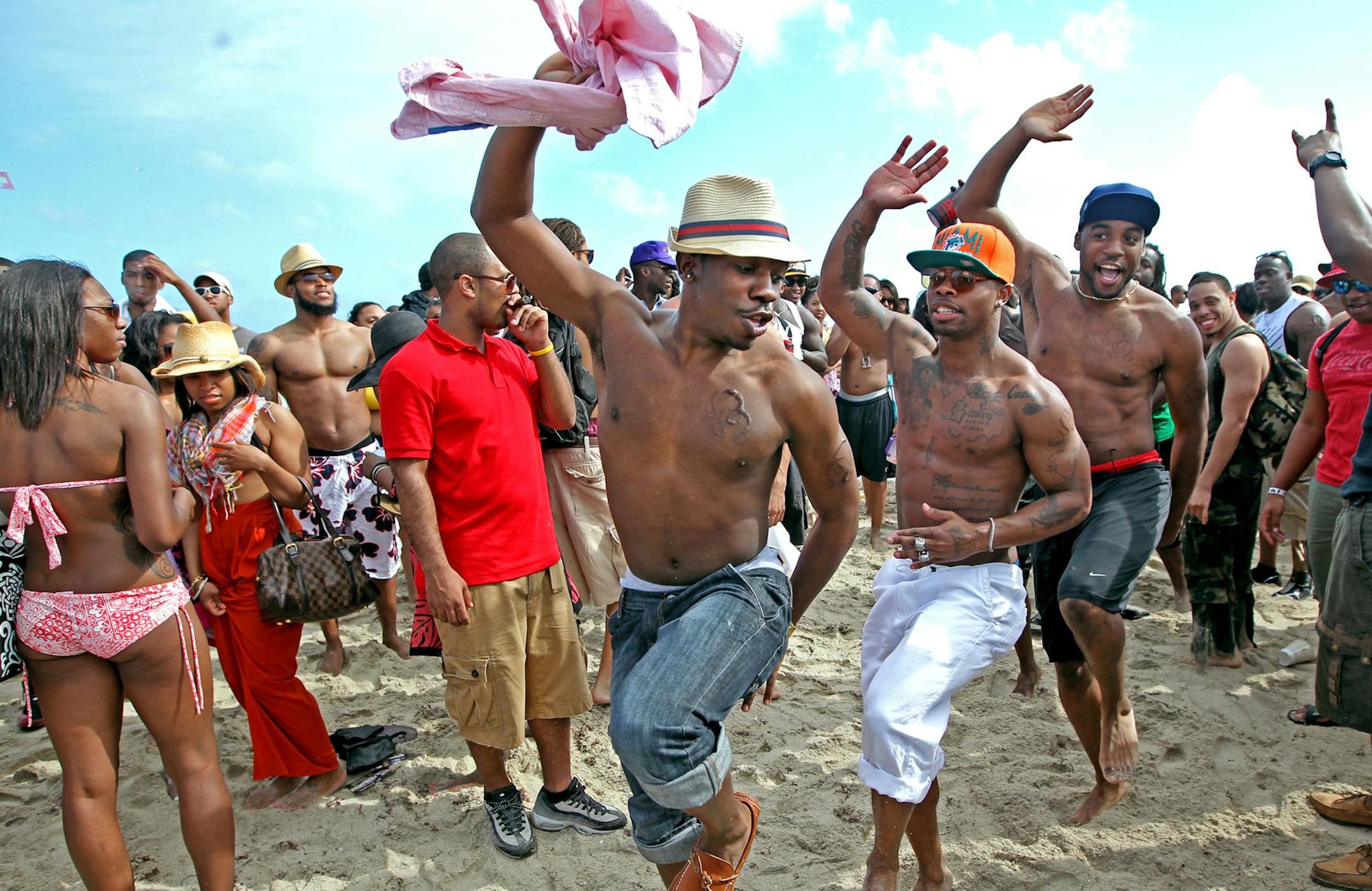 John Hunt, 24, of North Carolina A&T, dances with friends on South Beach in Miami, Florida, Friday, March 9, 2012. From North Carolina, to Indiana, and points in between, college students are flocking to South Florida to celebrate that fun-in-the-sun, coming-of-age ritual known as spring break. (Al Diaz/Miami Herald/MCT) ORG XMIT: 1119710