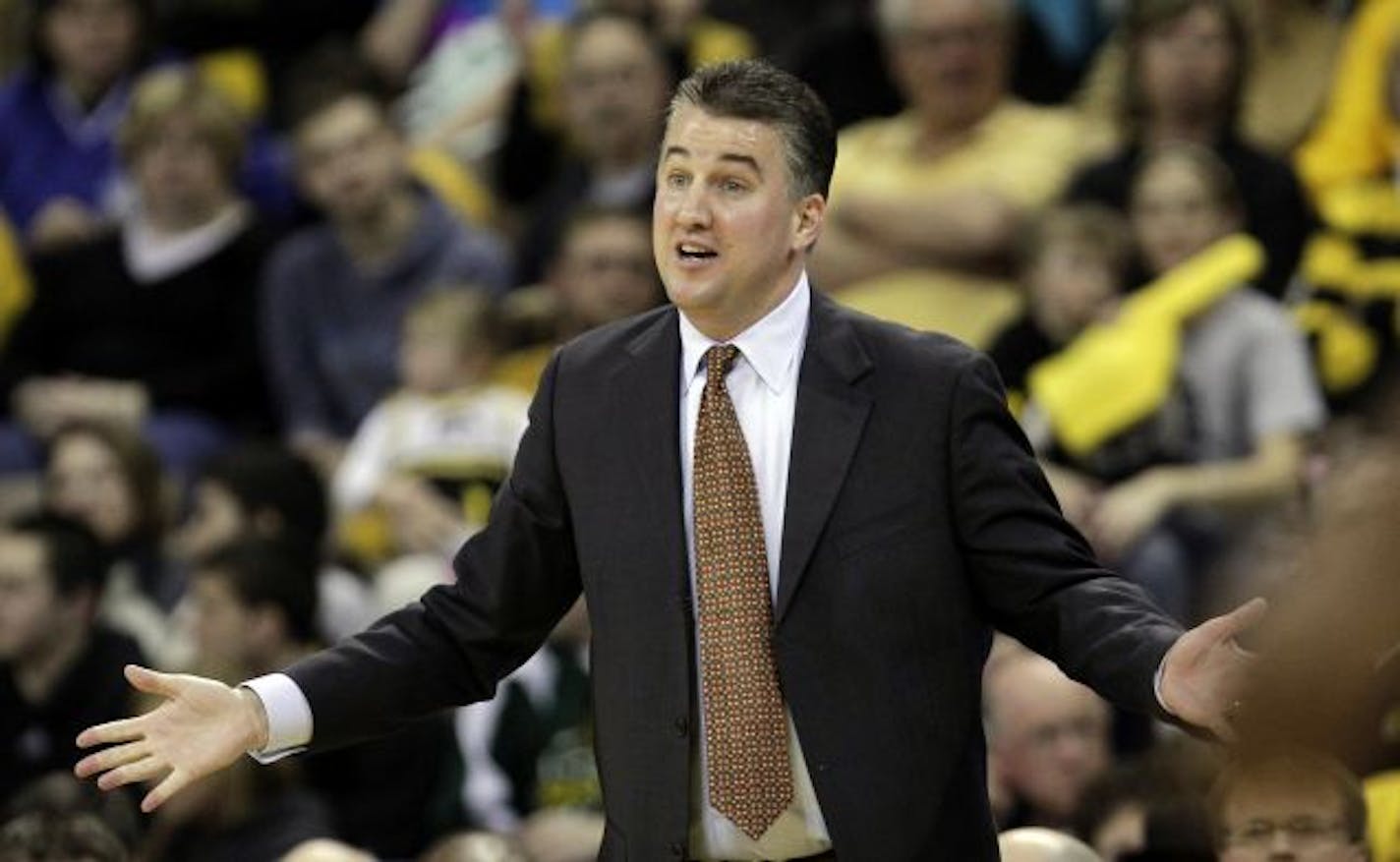 Purdue coach Matt Painter reacts to a call against his team during the first half of an NCAA college basketball game against Iowa, Saturday, March 5, 2011, in Iowa City, Iowa. Iowa won 67-65.