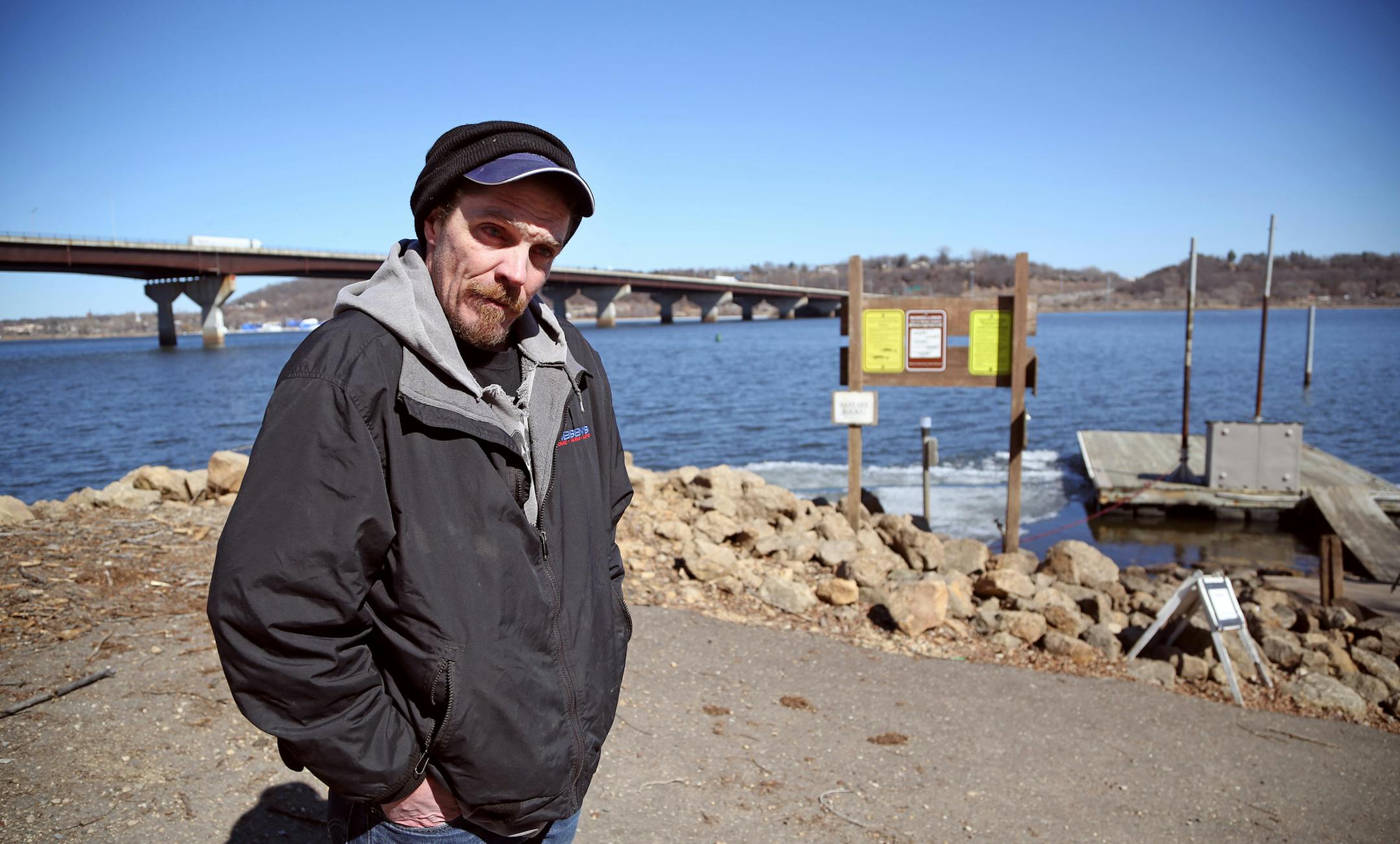 Emergency personnel rescued Chris Dedrickson after he was seen floating down the St. Croix River on a piece of ice Tuesday March 17, 2015 in Lakeland, Minnesota. ] Jerry Holt/ Jerry.Holt@Startribune.com