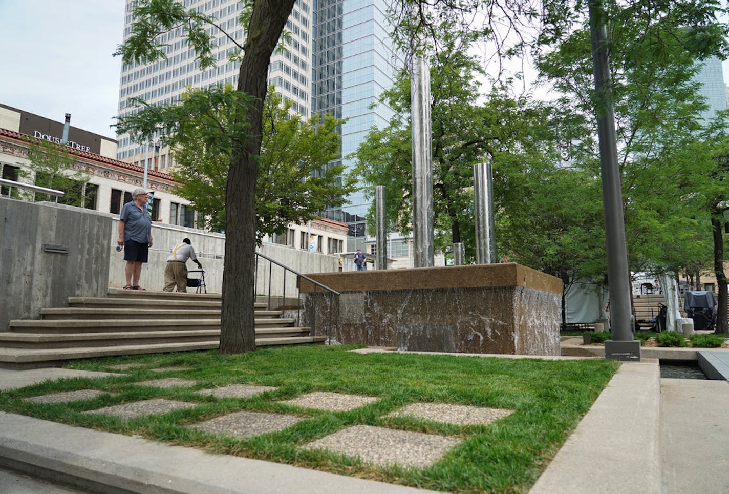 Permeable pavers replaced grass in heavily trafficked areas for accessibility.