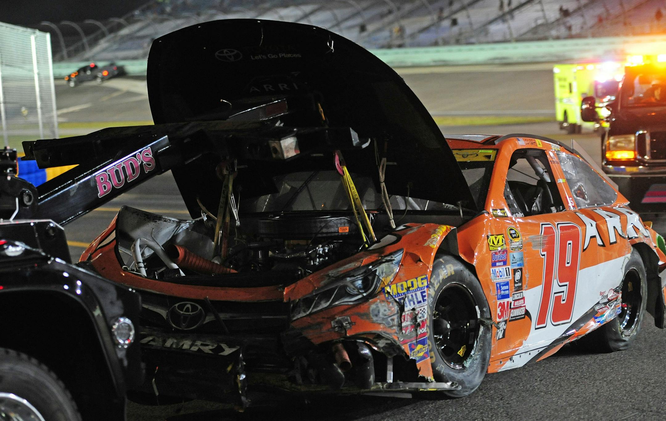 Carl Edwards' wrecked car is removed from the track after a crash in the Ford EcoBoost 400 NASCAR Sprint Cup Championship race on Sunday, Nov. 20, 2016 at Homestead-Miami Speedway in Florida. (Joe Cavaretta/Sun Sentinel/TNS) ORG XMIT: 1193445