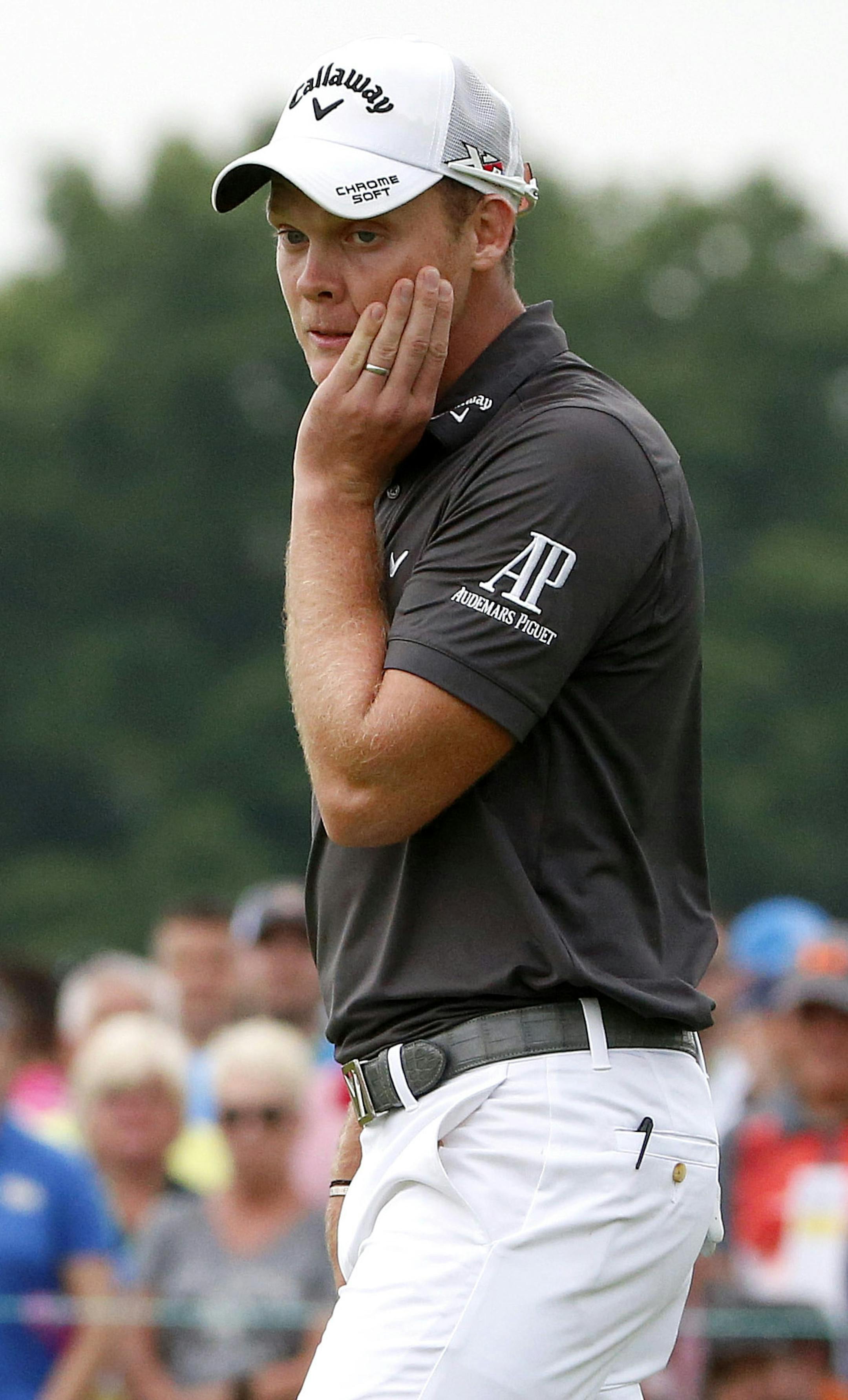 Danny Willett, of England, reacts after missing a putt on the seventh hole during the first round of the U.S. Open golf championship at Oakmont Country Club on Thursday, June 16, 2016, in Oakmont, Pa. (AP Photo/Gene J. Puskar) ORG XMIT: PACC10