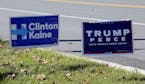 A Republican Presidential candidate Donald Trump campaign sign and a Democartic Presidential candidate Hillary Clinton sign are posted on a road 10 da