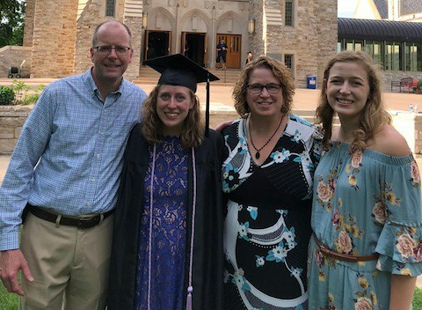 Pam and Dave Olson, daughters Bridget (graduating from St. Olaf) and Gretchen. A survivor of colon cancer, Pam didn't think she'd live to see this day.