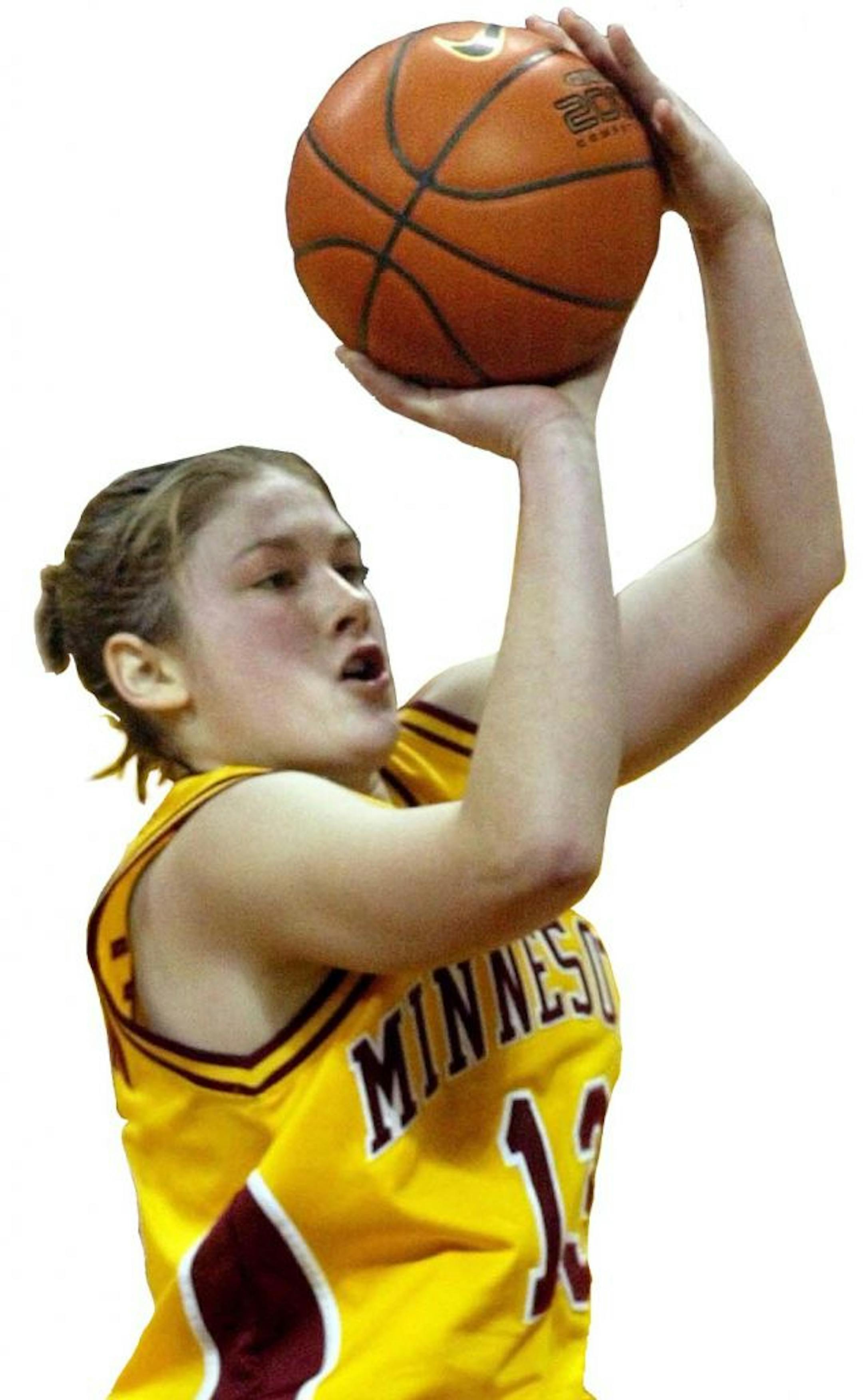 Minnesota's Lindsay Whalen goes up for two of her game-high 27 points in a win against Michigan.