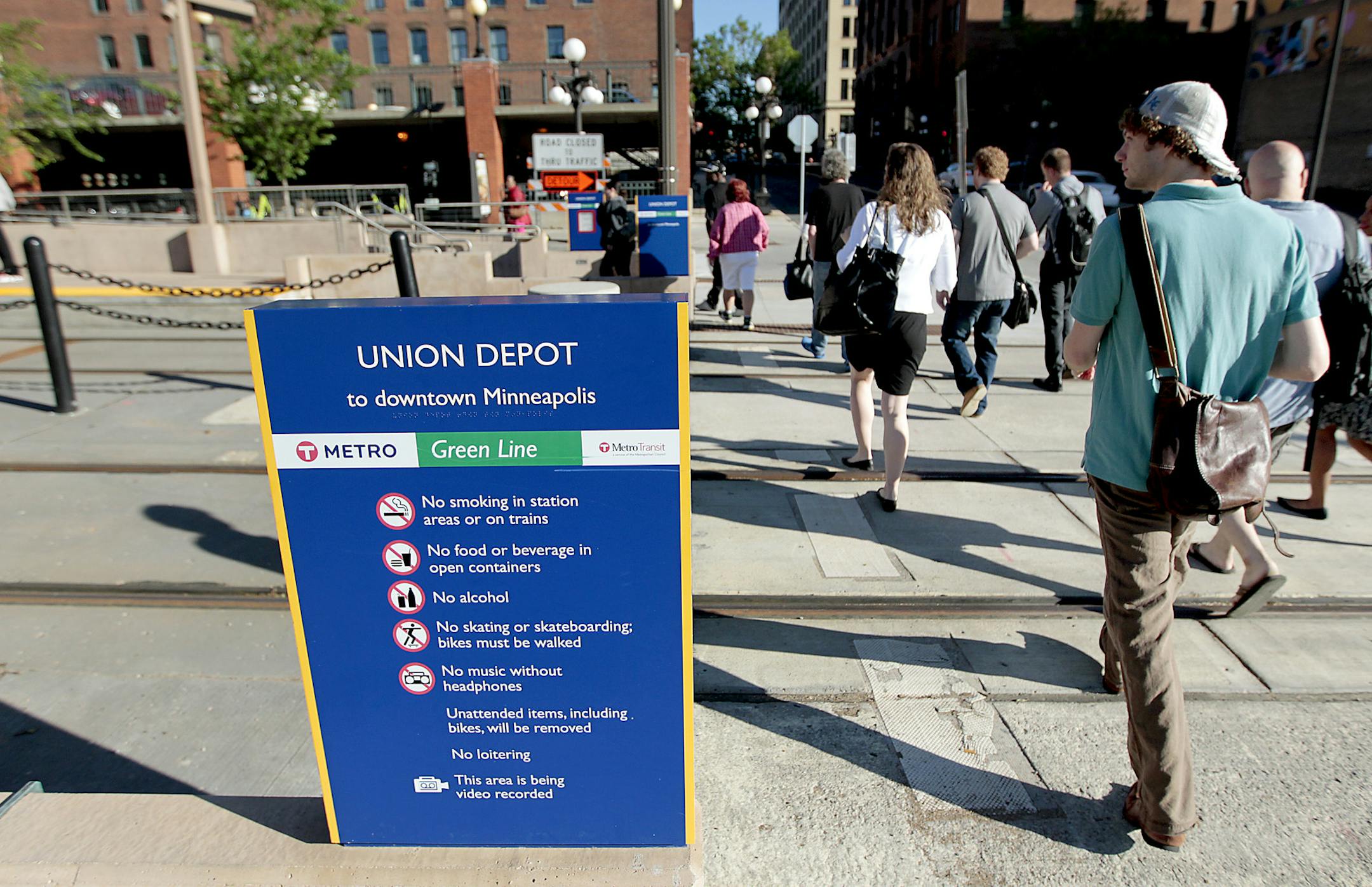 Commuters were guided to the right side of the trails by guides as they made their way onto the Greenline at the Union Depot, Monday, June 16, 2014 in St. Paul, MN. ] (ELIZABETH FLORES/STAR TRIBUNE) ELIZABETH FLORES • eflores@startribune.com