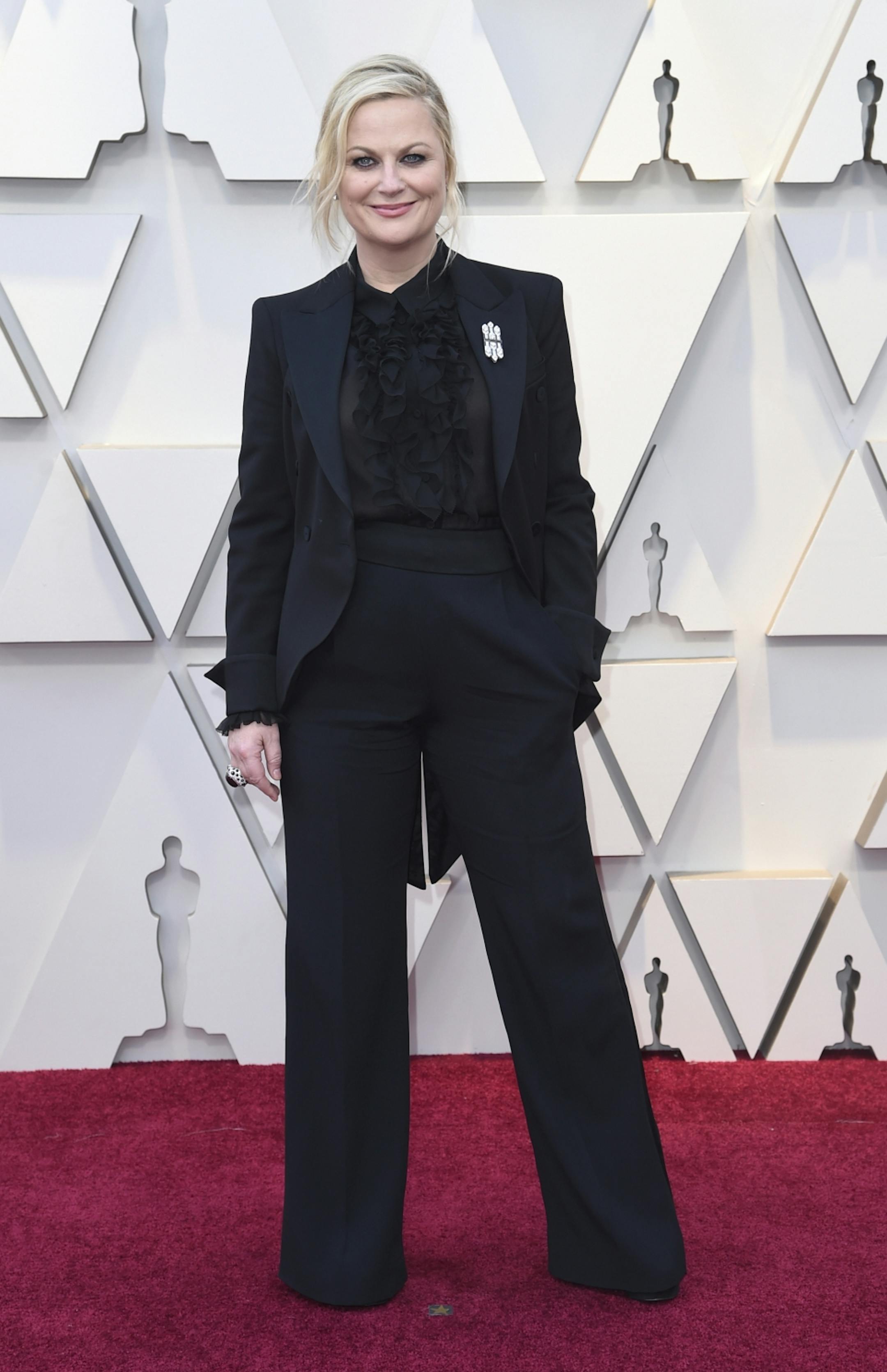 Amy Poehler arrives at the Oscars on Sunday, Feb. 24, 2019, at the Dolby Theatre in Los Angeles.