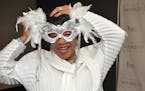 Former President and Board Chair of the General Mills Foundation, Reatha Clark King, Ph.D. gets in the spirit of the UNCF Masked Ball .