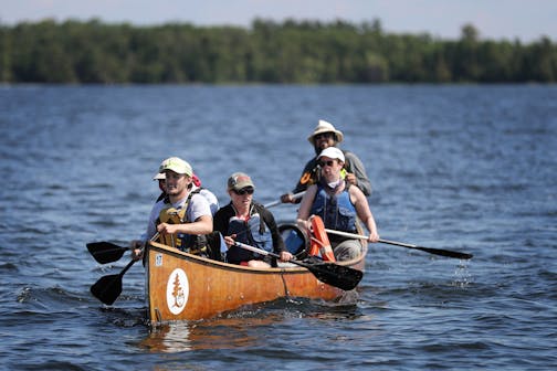 A group from the Wilderness Inquiry canoes in Kabetogama Lake at Voyageurs National Park. ] (Leila Navidi/Star Tribune) leila.navidi@startribune.com BACKGROUND INFORMATION: Voyageurs National Park in Minnesota on Thursday, June 23, 2016.