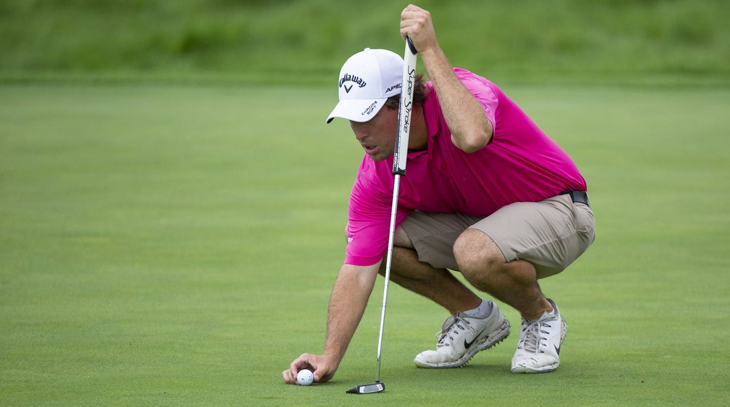 Brian Dwyer lines up his ball on the 18th green at Victory Links course during a Monday qualifying round. Dwyer finished the day with a 64, seven under par. ALEX KORMANN &#xa5; alex.kormann@startribune.com A Monday qualifying round round of golf was held at Victory Links course on Monday July 1, 2019 to determine who would make the cut for the 3M open to be held this week. Many hopefuls played their hearts out in an effort to earn one of four spots up for grabs in the PGA Tour event.